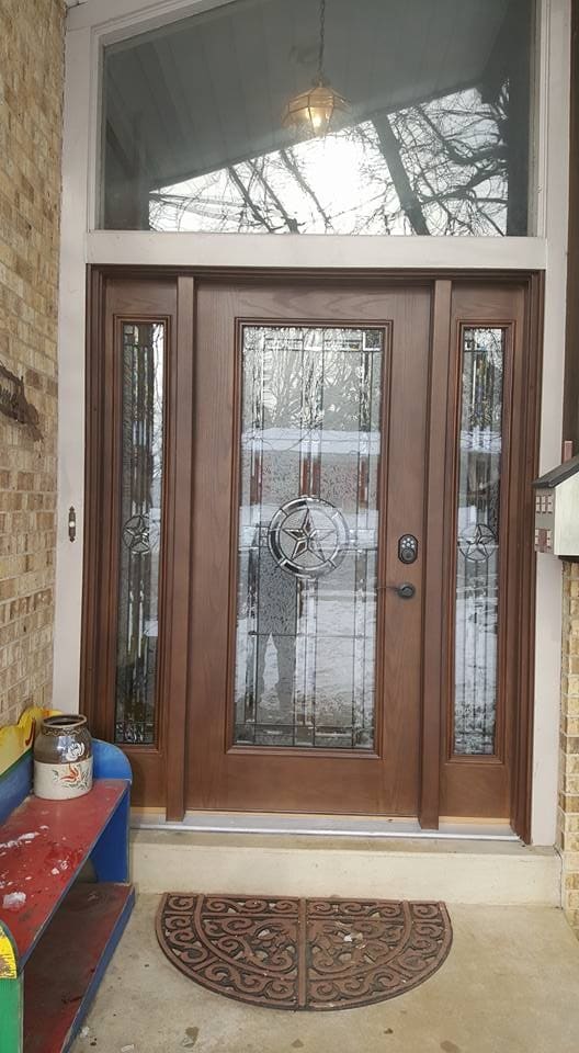 Fiberglass entry door with decorative glass and sidelights